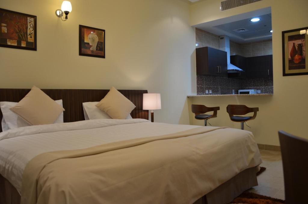 Pride Hotel Apartments Dubai Quarto foto
